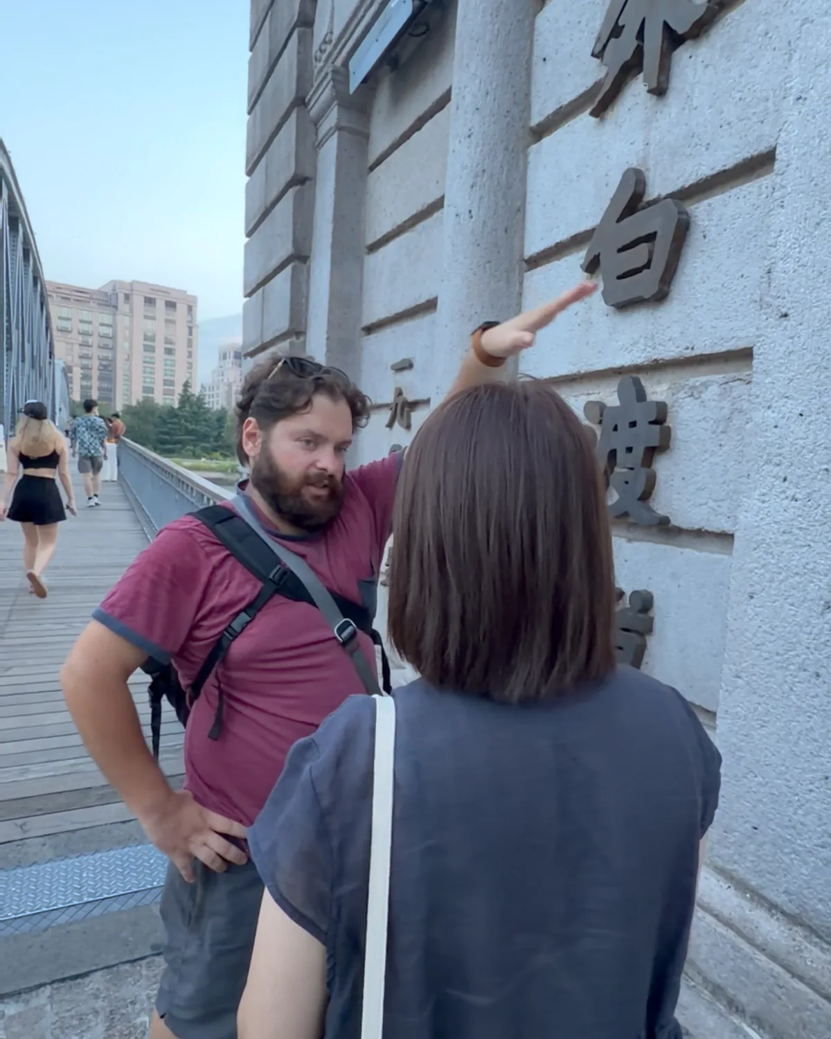 A guest and Local Buddy exploring together at Waibaidu Bridge