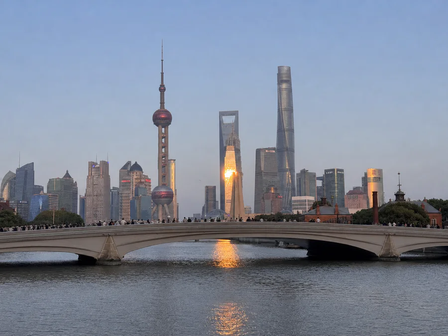 Shanghai skyline beyond a bridge across the water